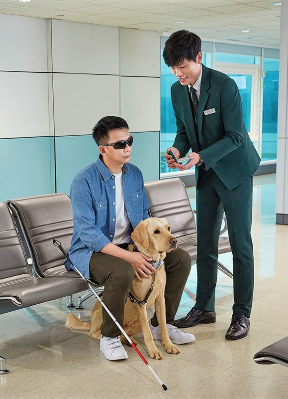 Man with guide dog